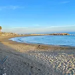 Malaga Beach And Sun